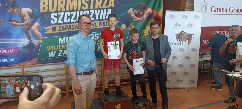 Zawodnicy na&nbsp;podium